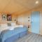 Rustic Cabins, sea views from rewilded farm with Highland Cows