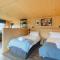 Rustic Cabins, sea views from rewilded farm with Highland Cows