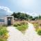Rustic Cabins, sea views from rewilded farm with Highland Cows
