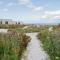 Rustic Cabins, sea views from rewilded farm with Highland Cows