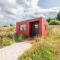 Rustic Cabins, sea views from rewilded farm with Highland Cows