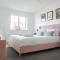 Spacious & Stylish 4-Bed House with Hot Tub in Prime Location