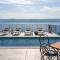 Seafront Villa Azzurro with heated pool