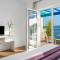 Seafront Villa Azzurro with heated pool