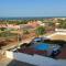 Apto com Ar com vista para praia de Morro Branco - Fortaleza - 贝贝里比