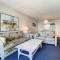 Ocean View with a beachfront pool at Ocean Trillium Condo ~ 102 - New Smyrna Beach