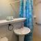 Poolside King Cottage with Kitchen - 10 Minutes to Beach!