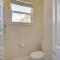 Sunny Waveland Home Rental with Pool Walk to Beach!