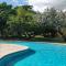 1br, 24hr security - City Charm with Poolside Peace - Port-of-Spain