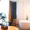 Xishu Garden Inn - Travel Agency service - Car Rent service - English Speaking