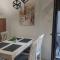 Riverside apartment with private parking