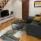 Riverside apartment with private parking