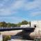 Riverside apartment with private parking