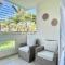 apartamento con piscina con vista al mar