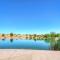 1919 Coral Ridge Across From Clubhouse and Pools! Golf Course Views!