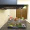 Heritage home with 2 bed/2 bath with kitchen in a residential neighborhood.