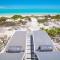 Aqua Del Rose 2 BR Beachfront Cottage