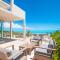 Aqua Del Rose 2 BR Beachfront Cottage