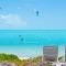 Aqua Del Rose 2 BR Beachfront Cottage