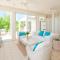 Aqua Del Rose 3 BR Beachfront Cottage