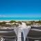Aqua Del Rose 3 BR Beachfront Cottage