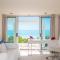 Aqua Del Rose 3 BR Beachfront Cottage