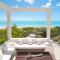 Aqua Del Rose 3 BR Beachfront Cottage