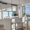Luxury Apartment on the 9th Floor near Stampede, Complimentary Wine, 2 Car UG Parking