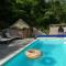 Gite unique et piscine privative dans un écrin de verdure - Calmont