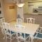 Enjoy breath taking sunsets in this 32 located right off the estuary OW10-403 - 新士麦那海滩