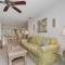 Beautifully updated bright and cheery 2nd story condo near pool beach access- SC261