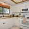 Beautifully updated bright and cheery 2nd story condo near pool beach access- SC261