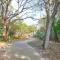 Beautifully updated bright and cheery 2nd story condo near pool beach access- SC261