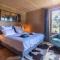 Luxe et détente : Lodge avec SPA privatif et accès piscine, golf, et aire de jeux. - FR-1-582-39