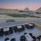 Pyramids Land Suites - 开罗