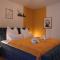 Design-Apartment I direkt im Zentrum I Boxspring I Nespresso I Terrasse mit Garten I Parkplatz