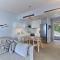 Private Luxury Scarlet beachfront villa, Molos, Paros