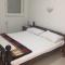 Apartments and rooms Niki 2