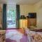 Strandvilla Hubertus Boltenhagen - Ferienwohnungen Apartment mit Parkplatz WLAN Küche Garten Grillplatz Waldbaden