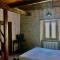 ISA-Rooms with private bathroom in a villa with fenced garden surrounded by greenery in the Garfagnana area, shared kitchen, shared hydromassage tub and sauna