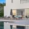 Villa Artemis - New Magnificent Beachfront Villa with Infinity Pool!