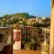 2 bedrooms apartement with sea view and enclosed garden at Taormina 2 km away from the beach