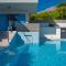 Villa Allegra with 32msq heated pool, 300m far from sandy beaches, open sea view
