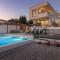 New modern luxury villa near the beach with sea view, pool, sauna , BBQ and playground by WiiBuk