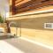 New modern luxury villa near the beach with sea view, pool, sauna , BBQ and playground by WiiBuk