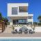New modern luxury villa near the beach with sea view, pool, sauna , BBQ and playground by WiiBuk