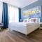 Hangar 19 Luxusapartment mit Sauna, Kamin, Dachterrasse und Seeblick H5W3