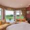 Country Lodge within Castle Ruins and own Loch 20 mins to St Andrews - Ceres