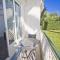 Garden Floor Condo with Promenade Sea View