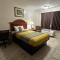 Carom Inn a Travelodge by Wyndham Denham Springs-Baton Rouge